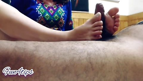 Hot foot job in a black dress for a guy with sexy eyes