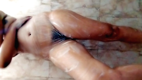 Bharrashthika rides a man in the shower and fucks him