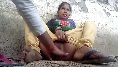Indian brunette is fucking on a large manhood outdoors