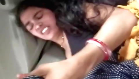 Indian amateur woman riding in the car with boyfriend