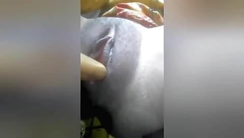 Indian girl masturbates on the sofa with her fingers
