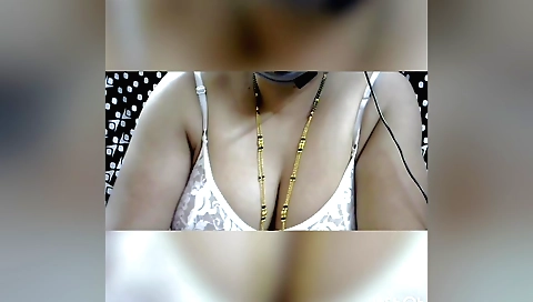 Horny indian beauty shows off her big boobs in a solo video