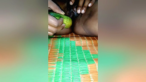 Indian woman masturbates in her private room with her dildo
