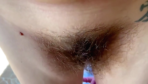 Bimbo has a really hairy pussy that I like watching