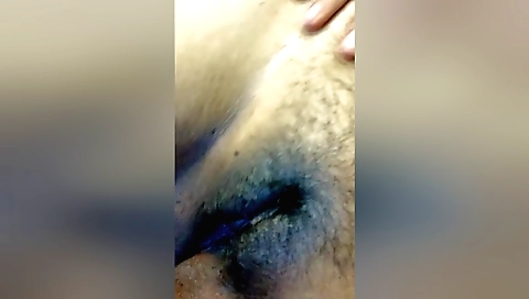 Indian girl with hairy pussy masturbates on the sofa