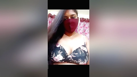 Indian blonde in a white blouse is masturbating in her bedroom