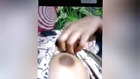 Indian woman with huge boobs is fucking in a bedroom