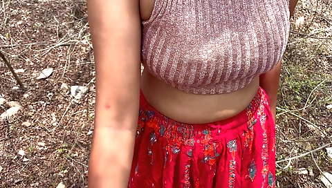 Indian girl plays with a guy in the sun on the school campus