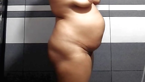 Sexy Indian chick with a hot body shows off body and gets naked