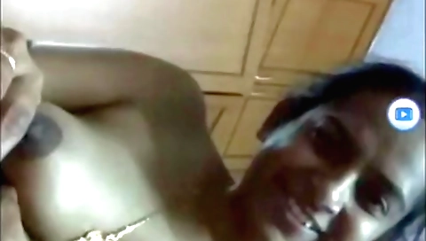 Indian brunette gets naked on webcam and masturbates