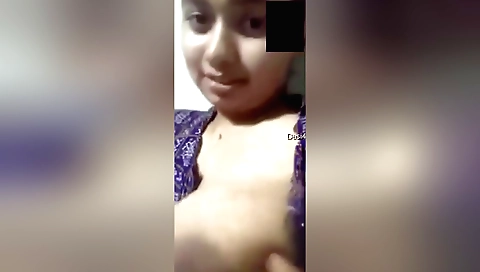 Indian brunette with big tits sucks her pussy solo
