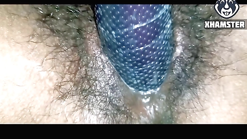 Busty redhead gets on top of her toy in hairy fetish video