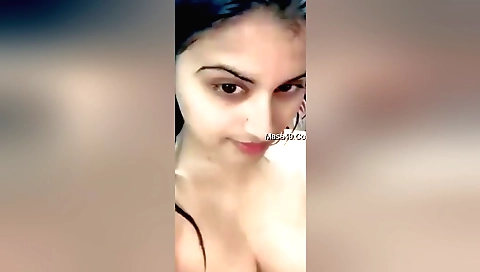 Sexy indian chick with small tits is nude on a couch