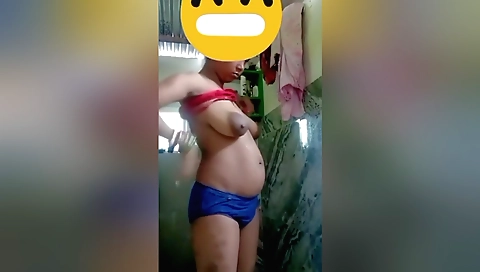 Hairy indian beautie in the bathroom is naked and bathing