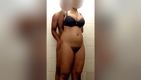 Indian slut rides and fucks with a dildo in a bathroom