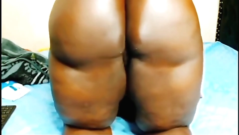 Indian girl with a nice ass oiled up with her pussy