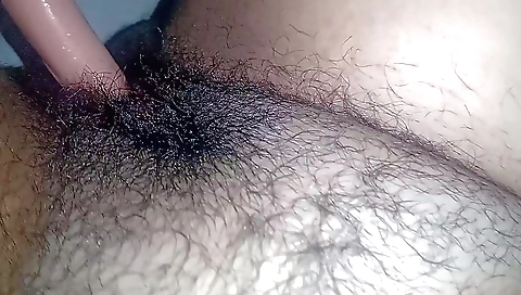 Indian girl is getting wet while sucking her pussy