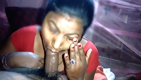Indian brunette is eating a dick in her mouth and mouth