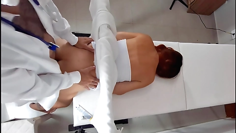 Red-haired amateur gives a blowjob to a gynecologist