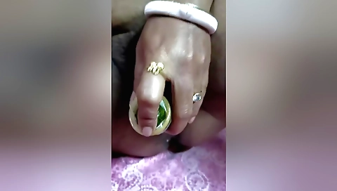 Sexy Indian chick with a nice round butt fucked with a dildo