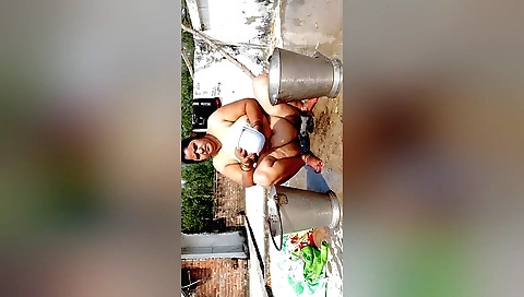 Indian milf in sexy black bra and long skirt in the sun