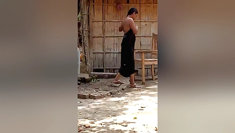 Busty indian babe is in the outdoor pool and soaking wet