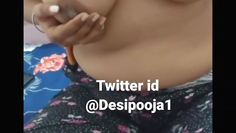 Amateur chick in a hot webcam video clip with her boobs exposed