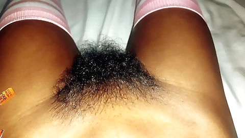 Indian schoolgirl showing her hairy pussy to the camera