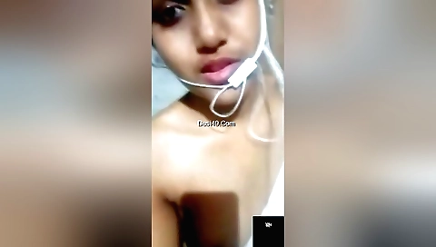Sexy brunette chick showing off her natural boobs on webcam