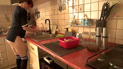 Sexy boobs and tits in the kitchen while the maid prepares the foo